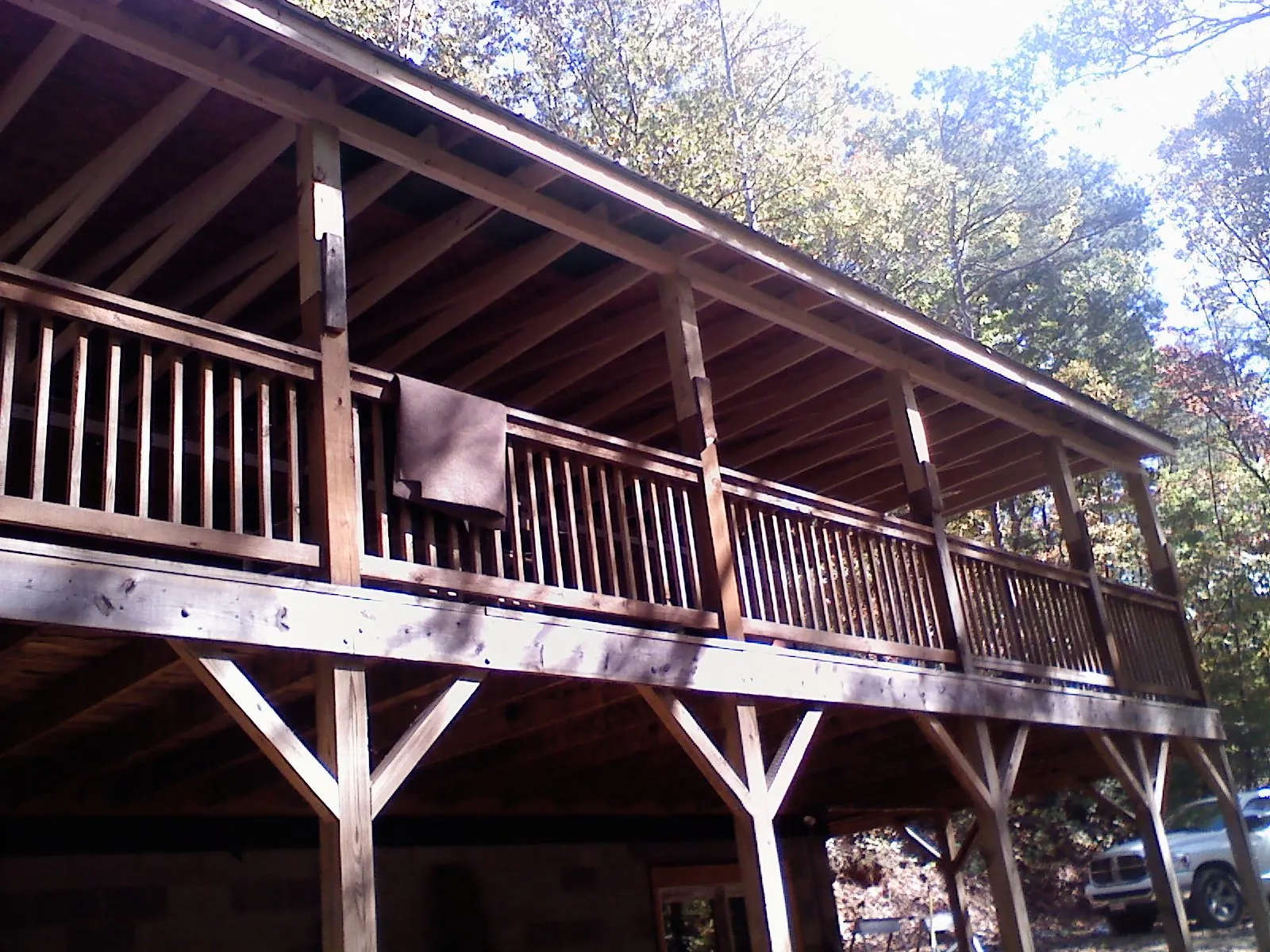 Timber framing under a new elevated porch and deck — Roof Leak Repair in Lowman by Roofing Brothers